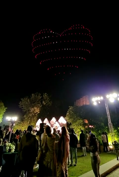 A layered heart formation above the wedding lawn