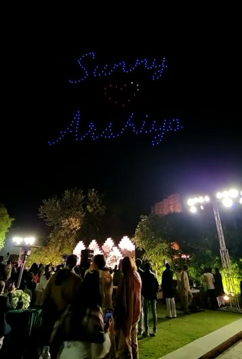 The couple’s names written in drone light above Alila Fort Bishangarh