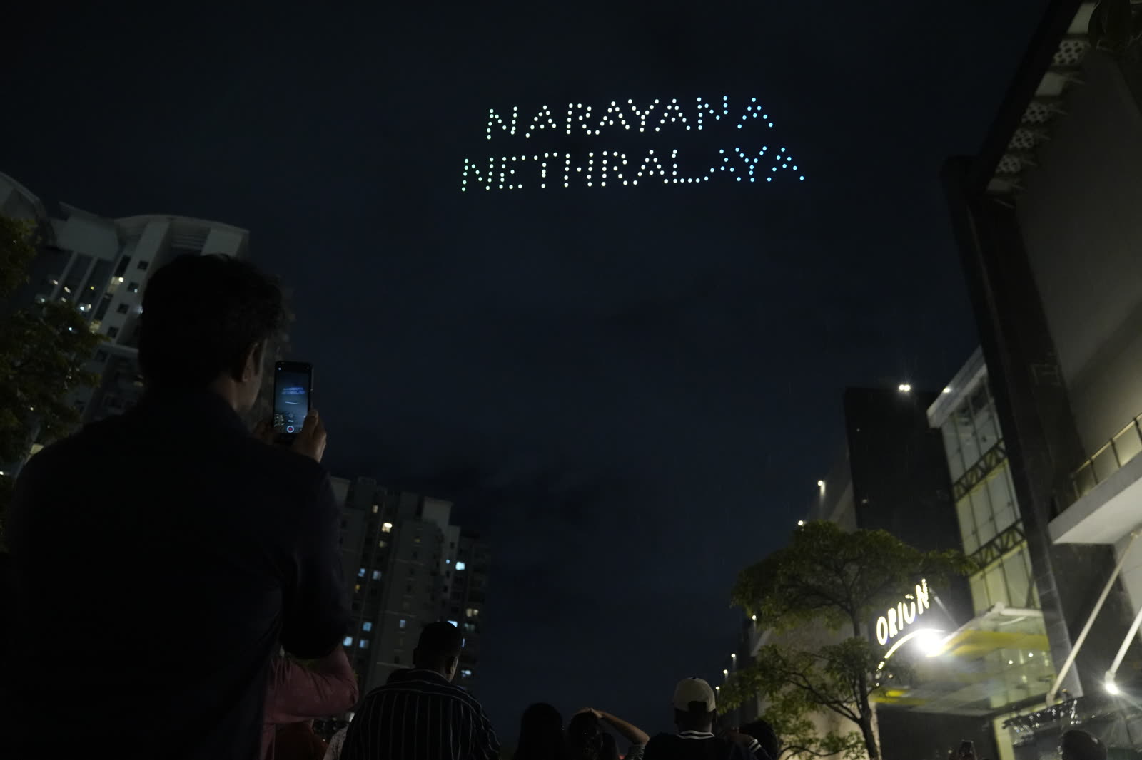 NARAYANA NETHRALAYA spelled out in drones over the Bengaluru skyline